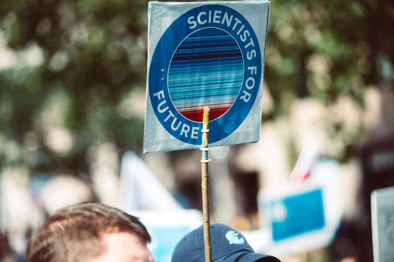 Protesters in Nuremberg advocate for climate action with 'Scientists for Future' signs.